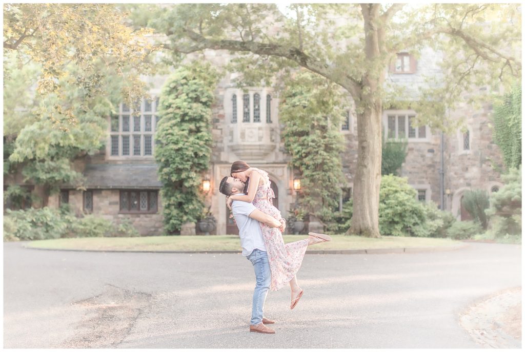 Photo of NJ Engaged couple during engagement session at The Castle at Skylands Manor in Ringwood NJ Captured by Diana and Korey Photo and Film