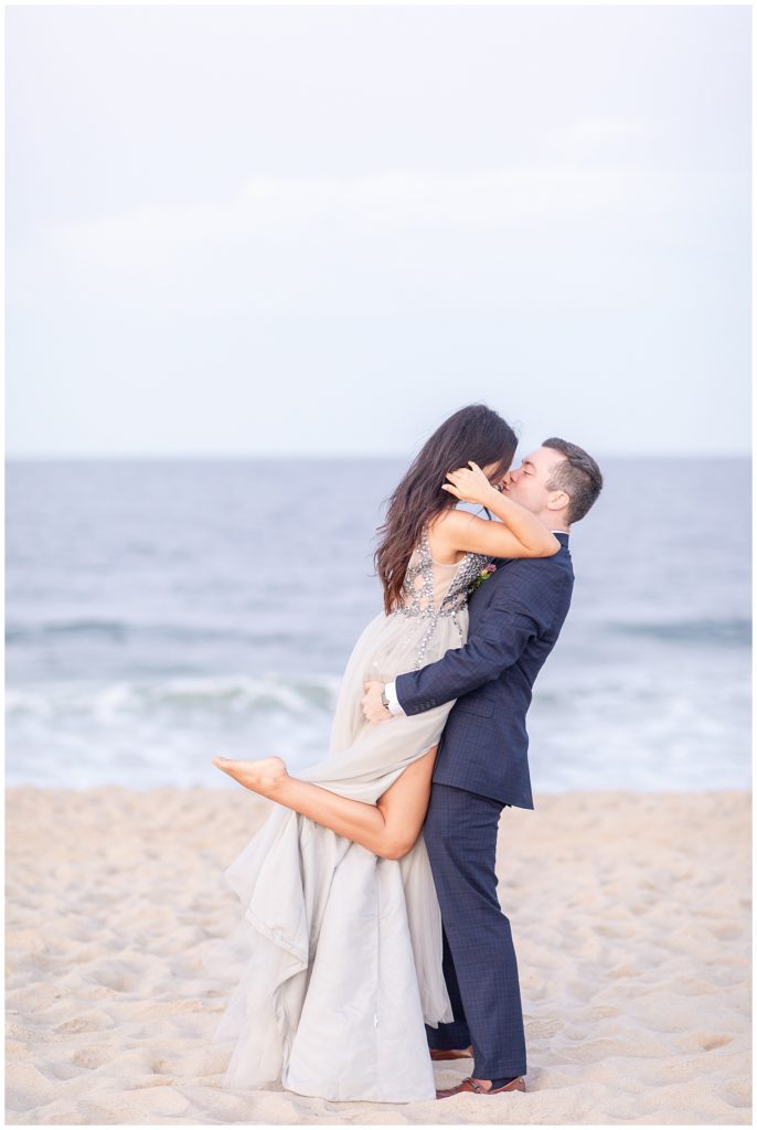 Husband and Wife dance on the beach during New Jersey Beach Elopement Session photographed by Diana and Korey Photo and Film.
