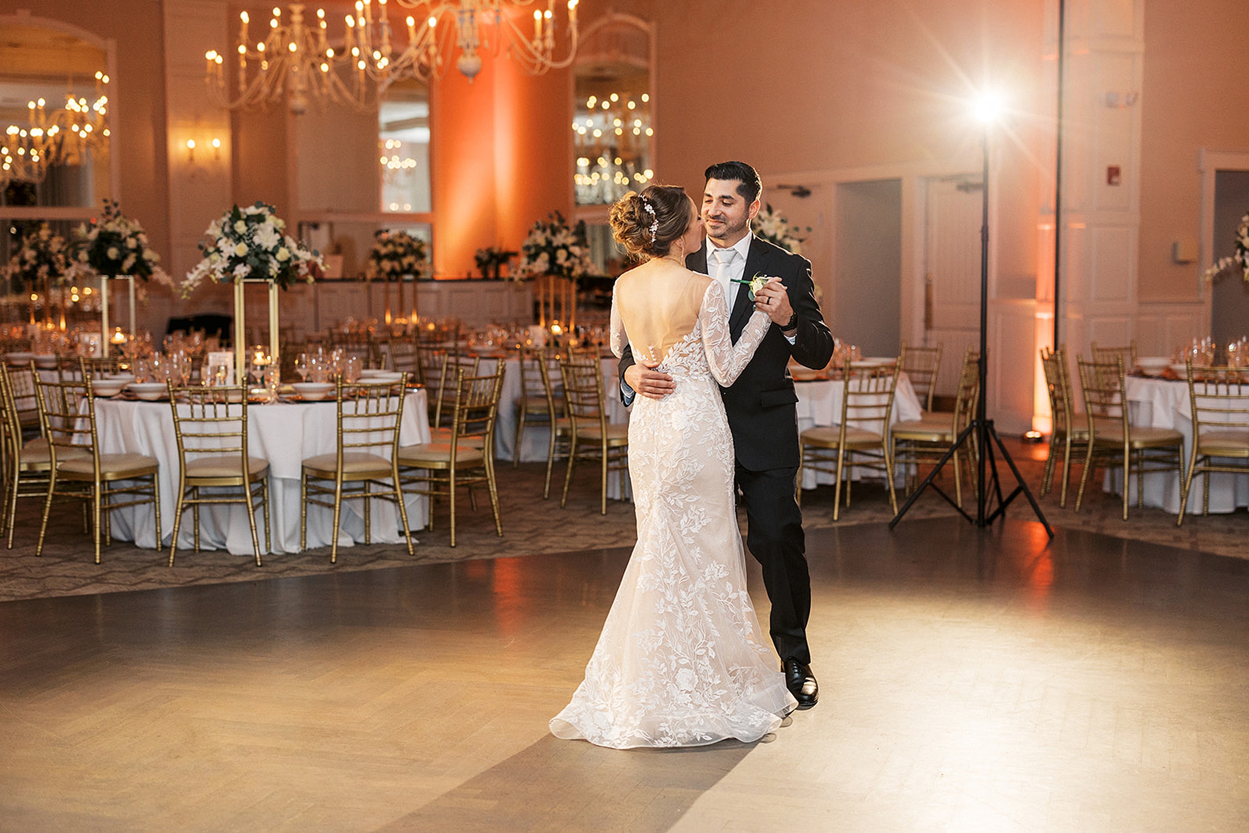 Newlyweds dance on the dance floor alone in the reception hall at a Crystal Springs Wedding