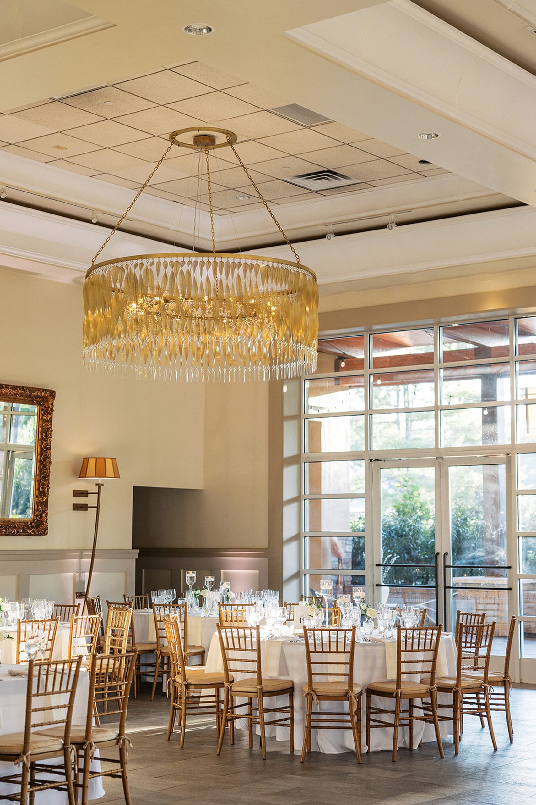 Details of a Stonehouse At Stirling Ridge Wedding reception set up with golden chairs