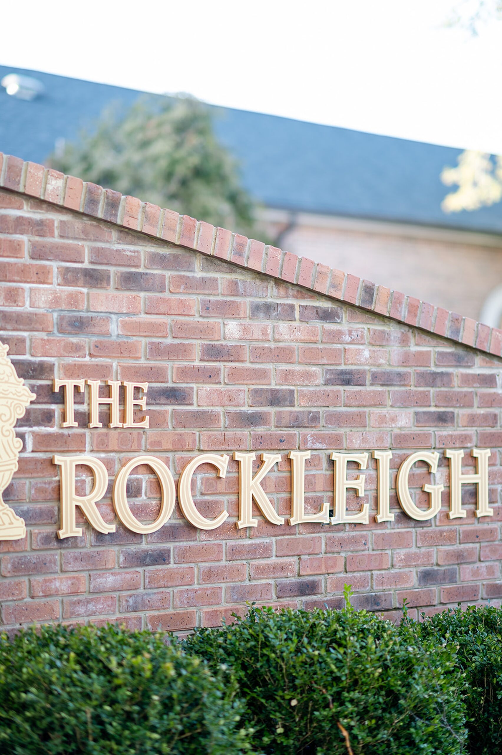 Details of the rockleigh wedding venue brick sign with gold lettering
