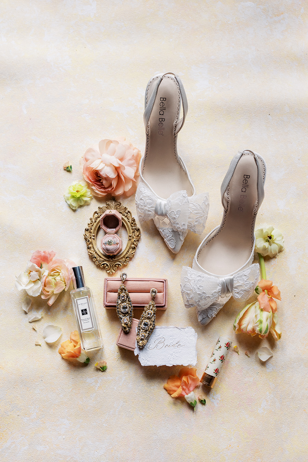 Bridal details sit on a white table