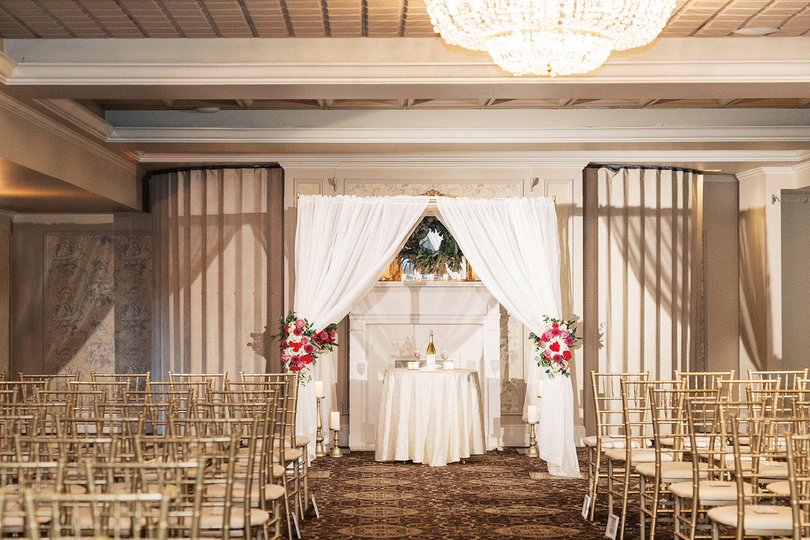 Details of a Jewish wedding ceremony set up with gold chairs Olde Mill Inn Wedding