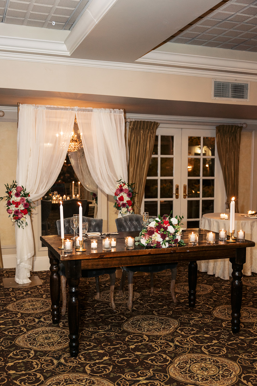 Details of the head table decorated for the newlyweds at an Olde Mill Inn Wedding
