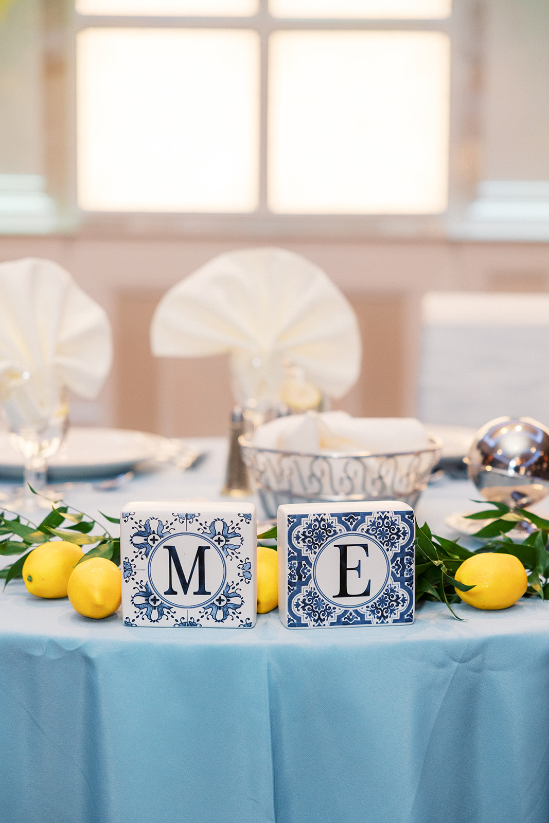 Details of custom letters at the newlyweds table for a wedding reception