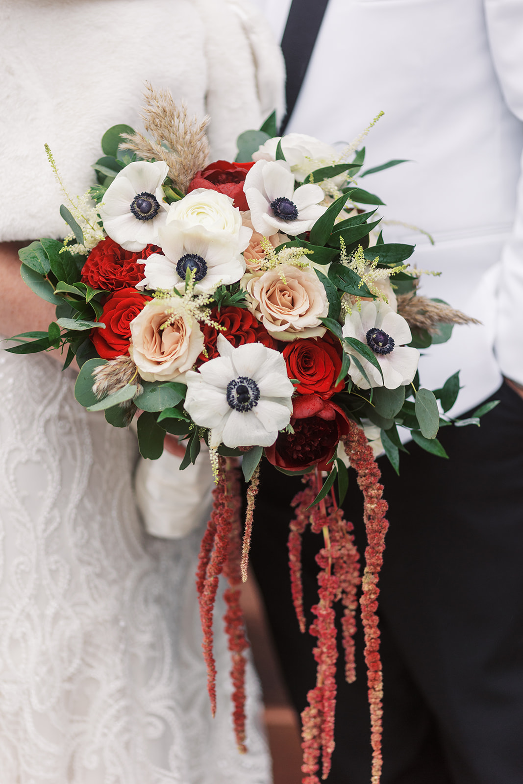 Details of a bridal bouquet with red and white flowers