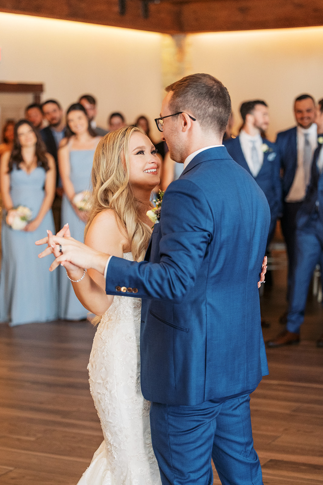Newlyweds dance for the first time at their wedding reception