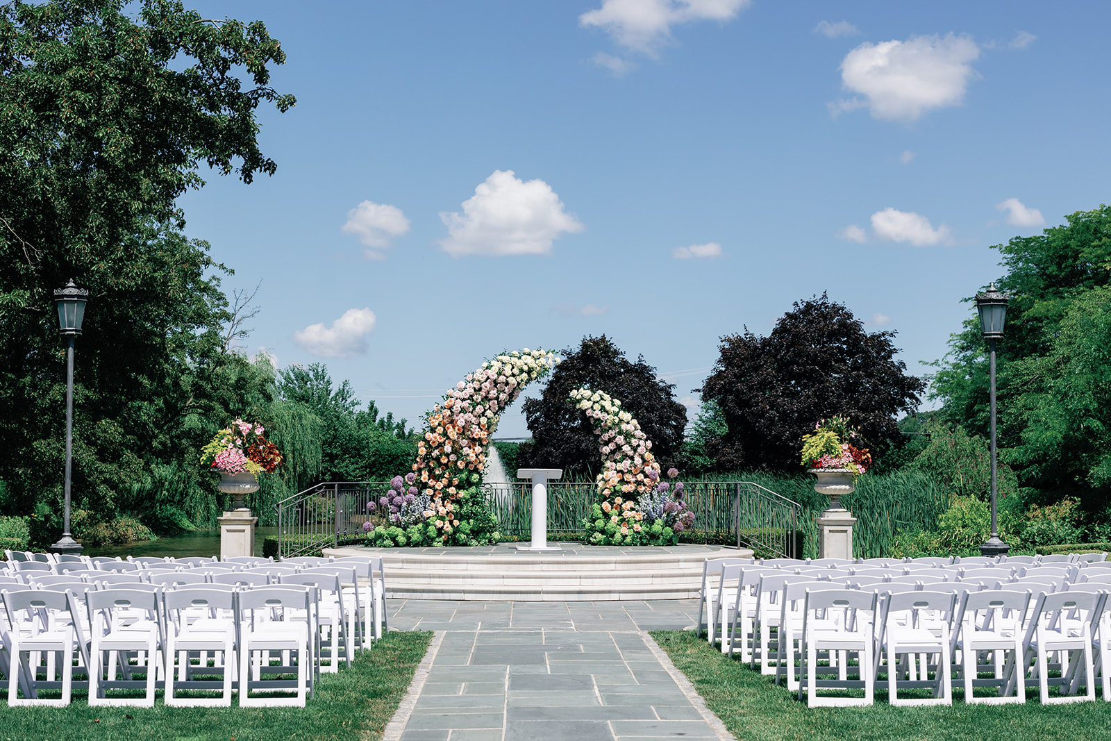 A view of a set up outdoor Park Chateau Wedding ceremony in the gardens