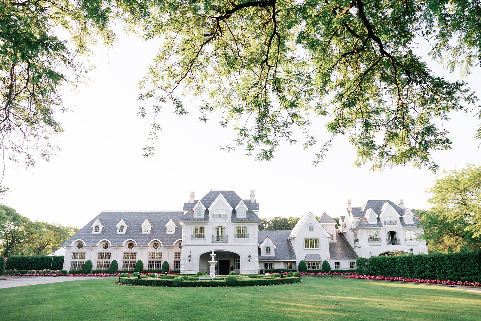 A view of the front of a lavish and luxurious wedding venue